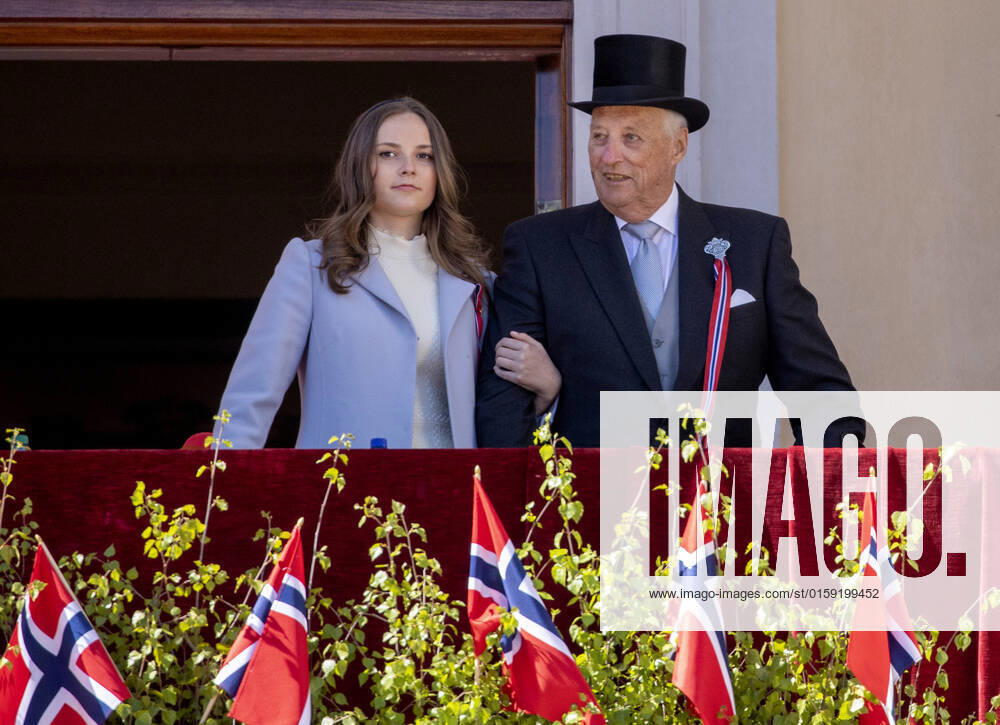 Oslo Princess Ingrid Alexandra and King Harald on the balcony during the children parade on National day at the palace square in Oslo. Â