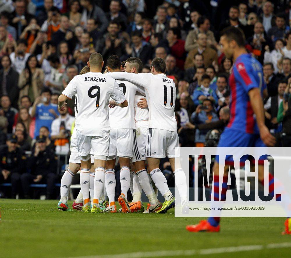 League BBVA match played between Real Madrid and UD Levante. In this picture, Cristiano Ronaldo celebrates first goal with teammates. L. Karim Benzema -
