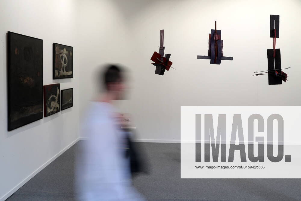 (220519) -- LISBON, May 19, 2022 -- A visitor walks past exhibits at the ARCOlisboa international contemporary art fair in Lisbon, Portugal, on May 19, 2022. The ARCOlisboa 2022 which kicked off on Thursday, will last till May 22. (Photo by Xinhua) PORTUGAL-LISBON-INTERNATIONAL CONTEMPORARY ART FAIR PedroxFiuza