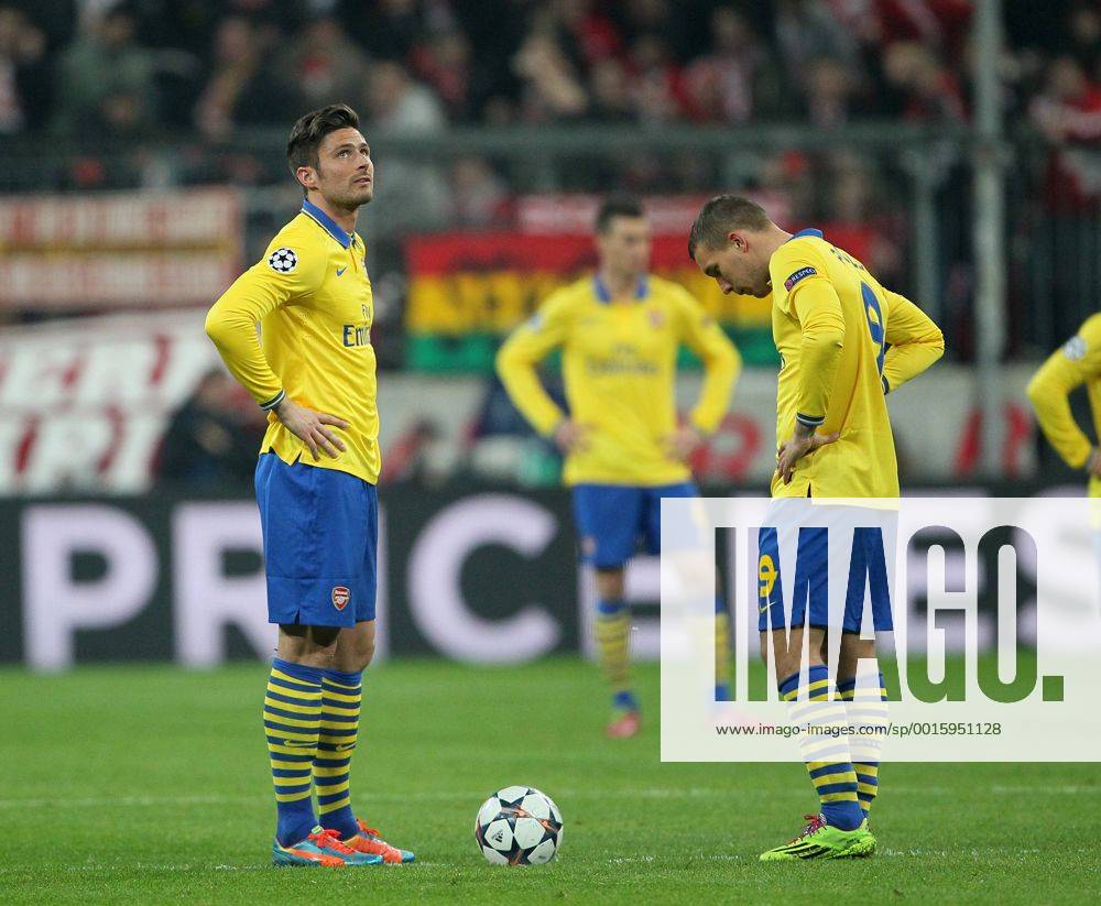Arsenal s Olivier Giroud looks on dejected after Bayern Munich s opening goal Bayern Munich v Arsenal - Champions League last 16 - Allianz Arena - Munich - Germany - 11 03 2014 - Pic DavidKlein Sportimage .