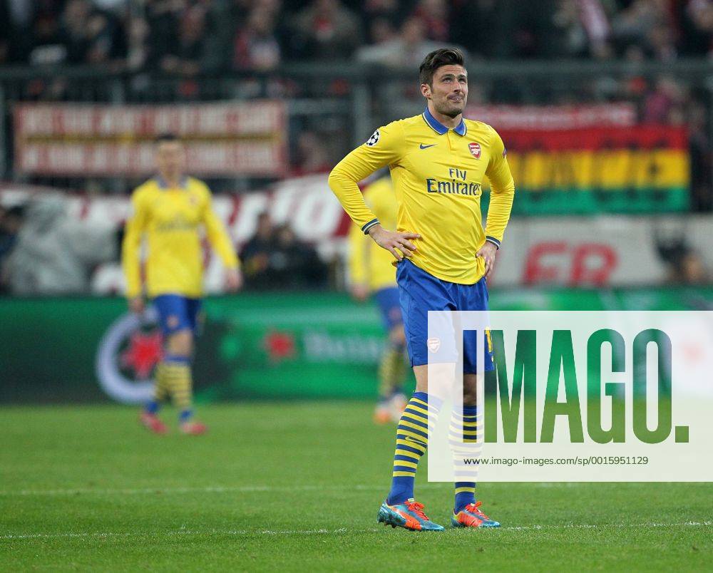Arsenal s Olivier Giroud looks on dejected after Bayern Munich s opening goal Bayern Munich v Arsenal - Champions League last 16 - Allianz Arena - Munich - Germany - 11 03 2014 - Pic DavidKlein Sportimage .