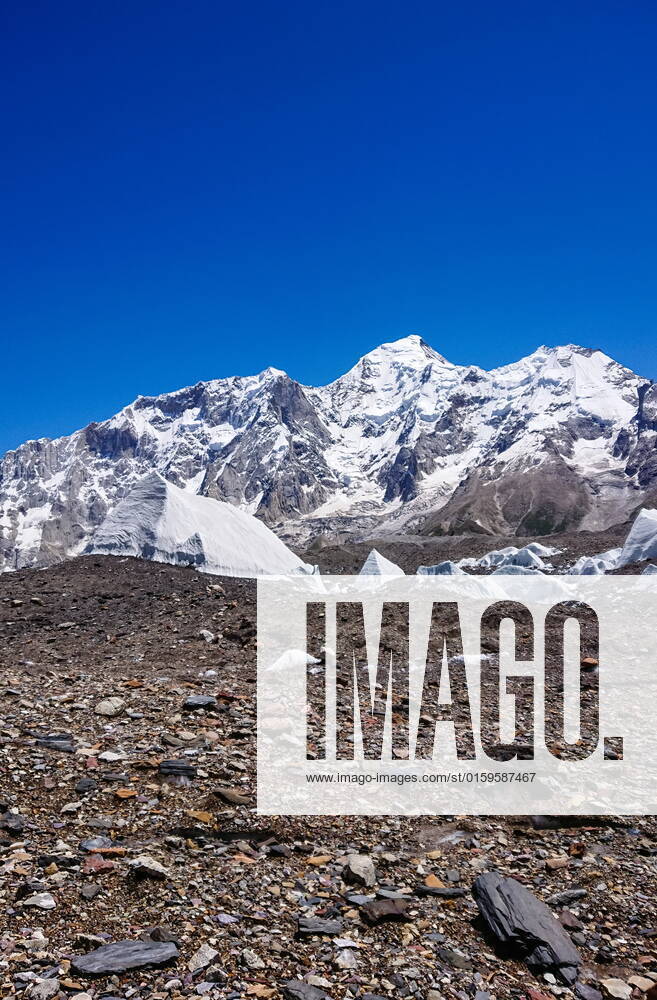 K2 and Broad Peak from Concordia in the Karakorum Mountains Pakistan , 27071134.jpg, tent, camping, alpine, areas, asia, backpacking, baltistan, baltoro, blue, brown, chogori, clear, cloud, colorful, concordia, concordiaplatz, destination, dramatic, eight-thousander, famous, gilgit-baltistan, glacier, godwin-austen, hiking, himalaya, ice, k2, karakoram, karakorum, landscape, large, mount, mountain, mountaineering, nature, northern, outdoors, pakistan, peak, rock, rugged, scenery, scenic, skardu, sky, snow-capped, summit, sunny, tourism,