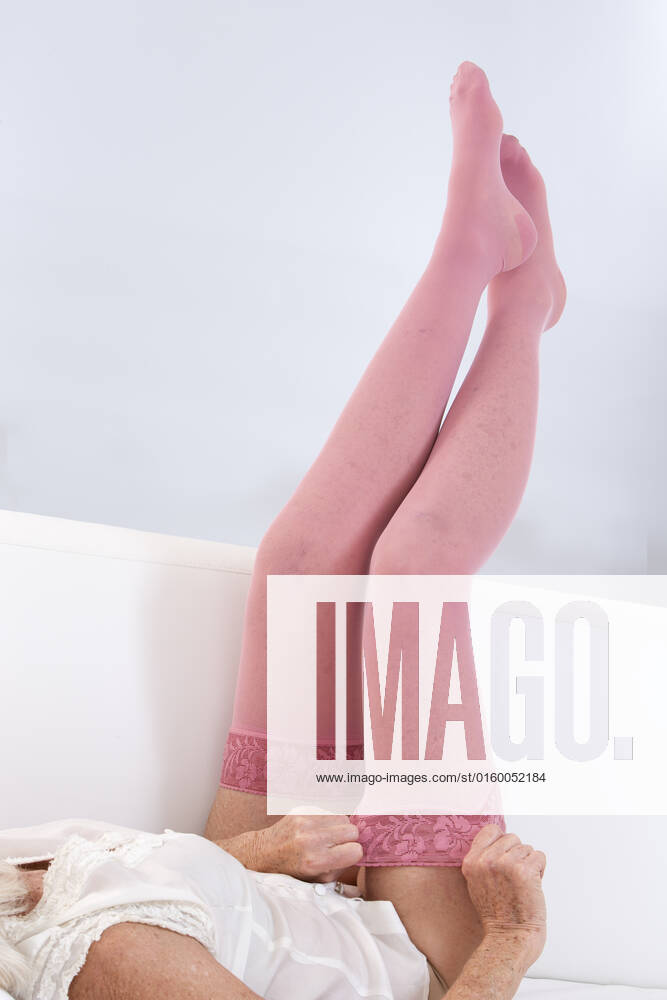 Woman putting thrombosis stockings on , 19650776.jpg, Anti, Bed, Bedroom, Pharmacist, Shelf, aching, adult, ankle, antithrombotic, arteries, background, bandage, beige, care, caucasian, clinic, compress, compression, compressive, difficulties, disease, doctor, dvt, edema, elastic, female, foot, hands, health, healthcare, heart, isolated, leg, lifestyle, limbs, lymph, lymphedema, medical, medicine, nodes, nursing, pharmacy, pressure, prosthesis, pull, retail, sick, stock, stocking, stockings, stool, store, studio, supplies, tedious, thrombosis, tighten, treatment, varicose, varicosis, veins, vertical, water, white, young,