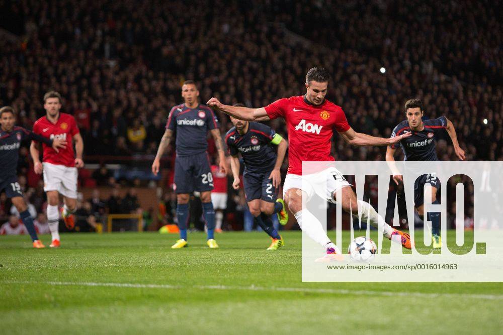 Robin van Persie of Manchester United scores the opening goal - UEFA Champions League Round of 16 - Manchester United vs. Olympiacos - Old Trafford - Manchester - England - 19th March 2014 - Picture Philip Oldham Sportimage .