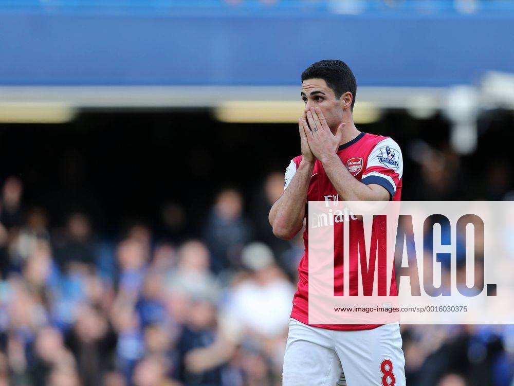 Arsenal s Mikel Arteta looks on dejected at the final whistle Chelsea vs Arsenal - Premier League - Stamford Bridge - London - England - 22 03 2014 - Pic David Klein Sportimage .