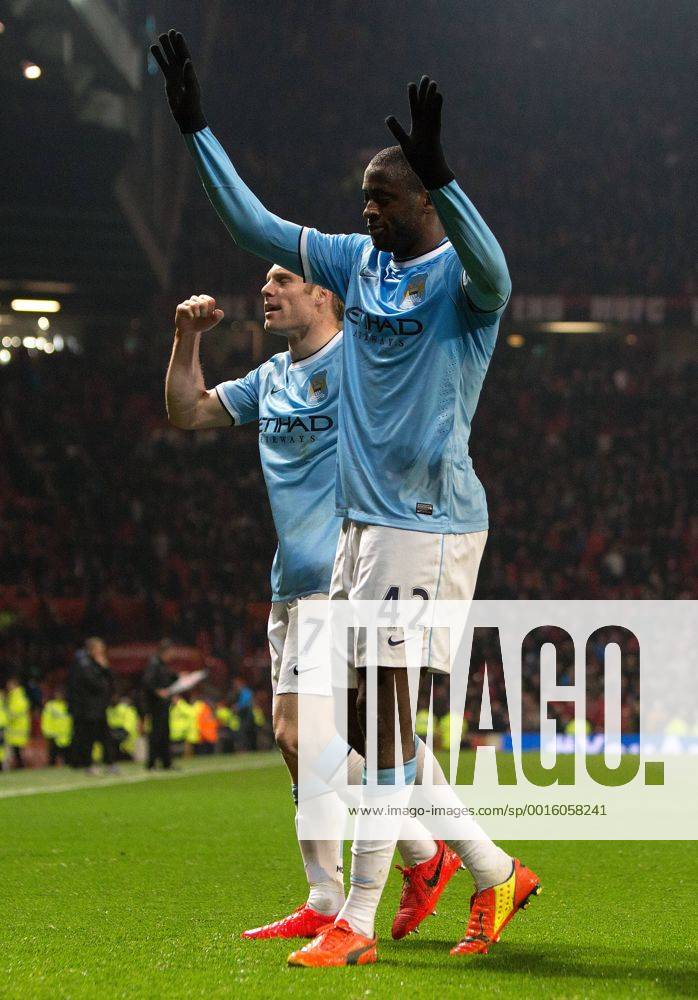 Yaya Toure of Manchester City celebrates scoring his sides third goal - Barclays Premier League - Manchester United vs. Manchester City - Old Trafford - Manchester - England - 25th March 2014 - Picture PhilipOldham Sportimage .