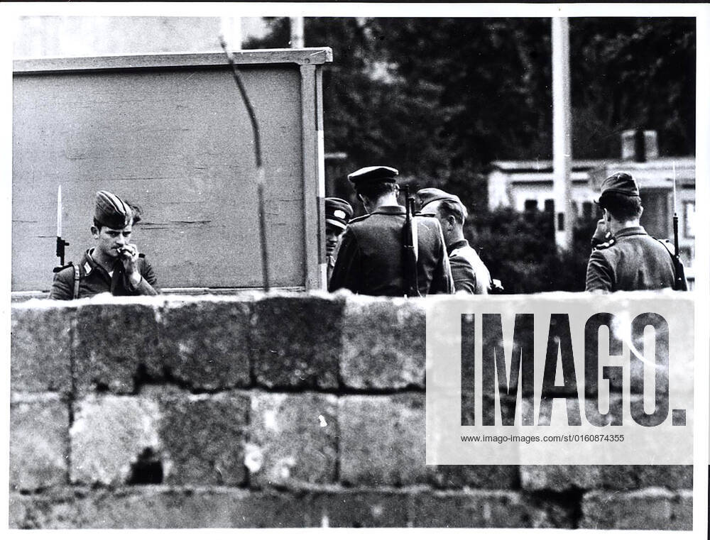 August 1961 - East German Troops and Police Group Together Behind The Wall Built By The Communists to Seal Off East Berlin From The Western Part of the City 1062_05_M_-12882-