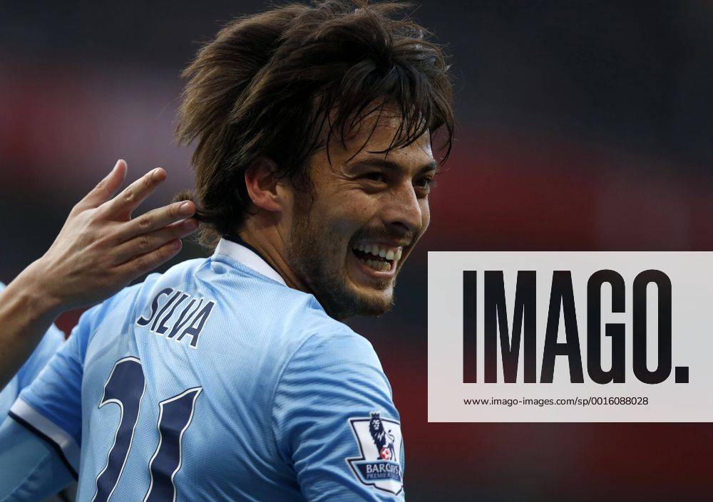 David Silva of Manchester City celebrates scoring during the Barclays Premier League match between Arsenal and Manchester City at Emirates Stadium in London, Britain on March 29, 2014. The match ended with a 1-1 draw. (Xinhua Wang Lili) (SP) LONDON-SOCCER-PREMIER LEAGUE-- ARSENAL FC London VS MANCHESTER CITY