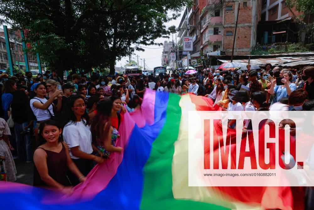 Members of LGBTQIA+ communities waves the rainbow flag during Fourth Annual Nepal Pride Parade,Kathmandu. The rainbow flag is a symbol of lesbian, gay, bisexual, transgender (LGBT) and queer pride and LGBT social movements. Kathmandu Nepal - ZUMAm204 20220611_zip_m204_001