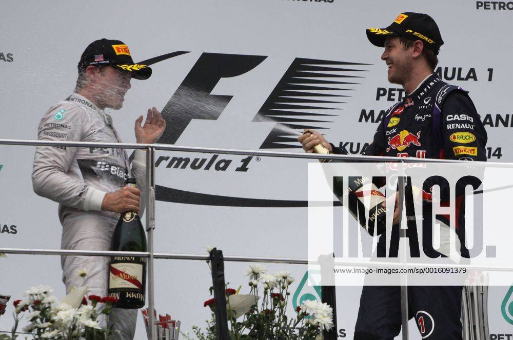 Lewis Hamilton; Mercedes Grand Prix, Sebastian Vettel; Red Bull Racing, Podium, Malaysia in Kuala Lumpur Sepang 30.03.2014 Photo:mspb Thomas Melzer Lewis Hamilton; Sebastian Vettel; Podium, formula 1 GP, Malaysia,