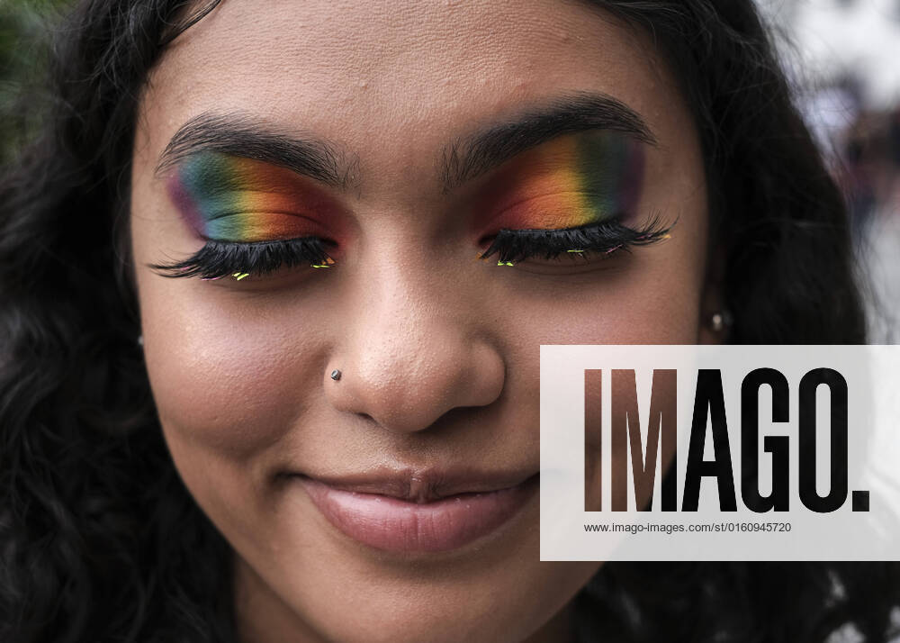 Washington, District of Columbia, United State: A woman is seen with her eyes painted in the colours of the rainbow during the annual Pride Parade celebrations in Washington DC. Thousands gathered for the parade, which was back fully in-person after two years of modified celebrations because of the pandemic. The hours-long celebration spread along a 1Ã‚Â½-mile route through the Shaw, Logan Circle and Dupont Circle neighborhoods in Washington D.C. Washington United State - ZUMAr125 20220611_zap_r125_028