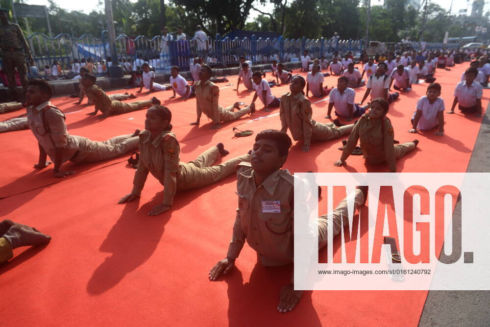 June 21, 2022, Kolkata, India: Military are seen practicing yoga during massive yoga session as part of the celebration of the International Yoga Day. on June 21, 2022 in Kolkata, India. Kolkata India - ZUMAe321 20220621_zia_e321_007