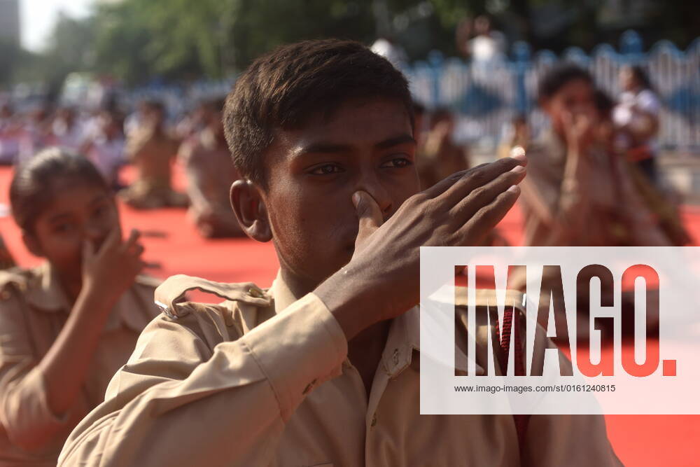 June 21, 2022, Kolkata, India: Military are seen practicing yoga during massive yoga session as part of the celebration of the International Yoga Day. on June 21, 2022 in Kolkata, India. Kolkata India - ZUMAe321 20220621_zia_e321_009