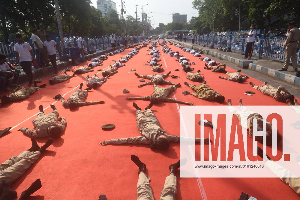 June 21, 2022, Kolkata, India: Military are seen practicing yoga during massive yoga session as part of the celebration of the International Yoga Day. on June 21, 2022 in Kolkata, India. Kolkata India - ZUMAe321 20220621_zia_e321_010