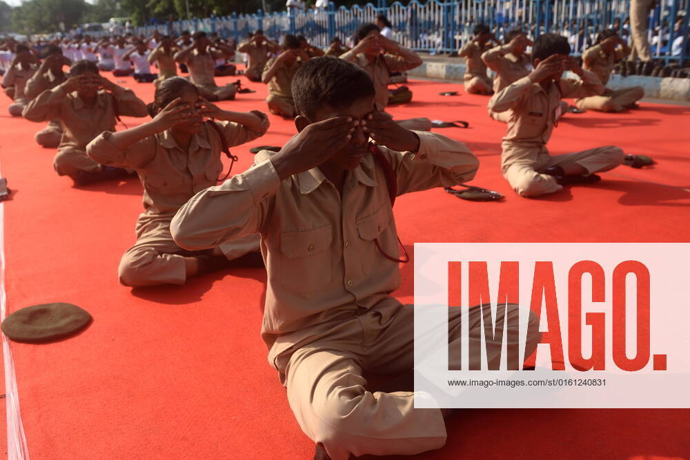 June 21, 2022, Kolkata, India: Military are seen practicing yoga during massive yoga session as part of the celebration of the International Yoga Day. on June 21, 2022 in Kolkata, India. Kolkata India - ZUMAe321 20220621_zia_e321_012