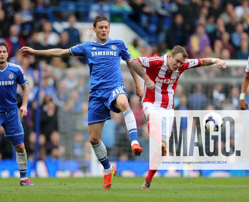 Chelsea s Nemanja Matic tussles with Stoke s Glenn Whelan Chelsea vs Stoke City- Premier League - Stamford Bridge- London - England - 05 03 2014 - Pic David Klein Sportimage .