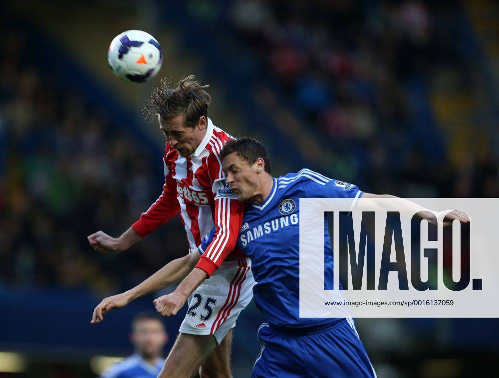 Chelsea s Nemanja Matic tussles with Stoke s Peter Crouch Chelsea vs Stoke City- Premier League - Stamford Bridge- London - England - 05 03 2014 - Pic David Klein Sportimage .
