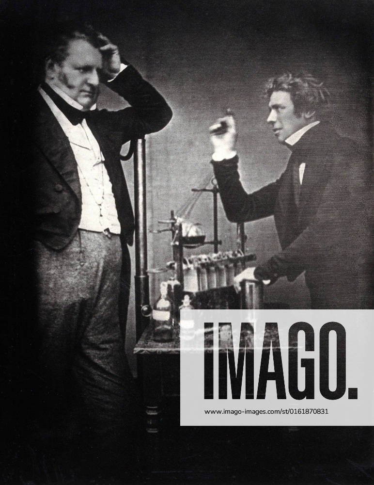 Michael Faraday (right) with John Frederick Daniell (inventor of the electrochemical cell). Copy photograph after the 1843 original.