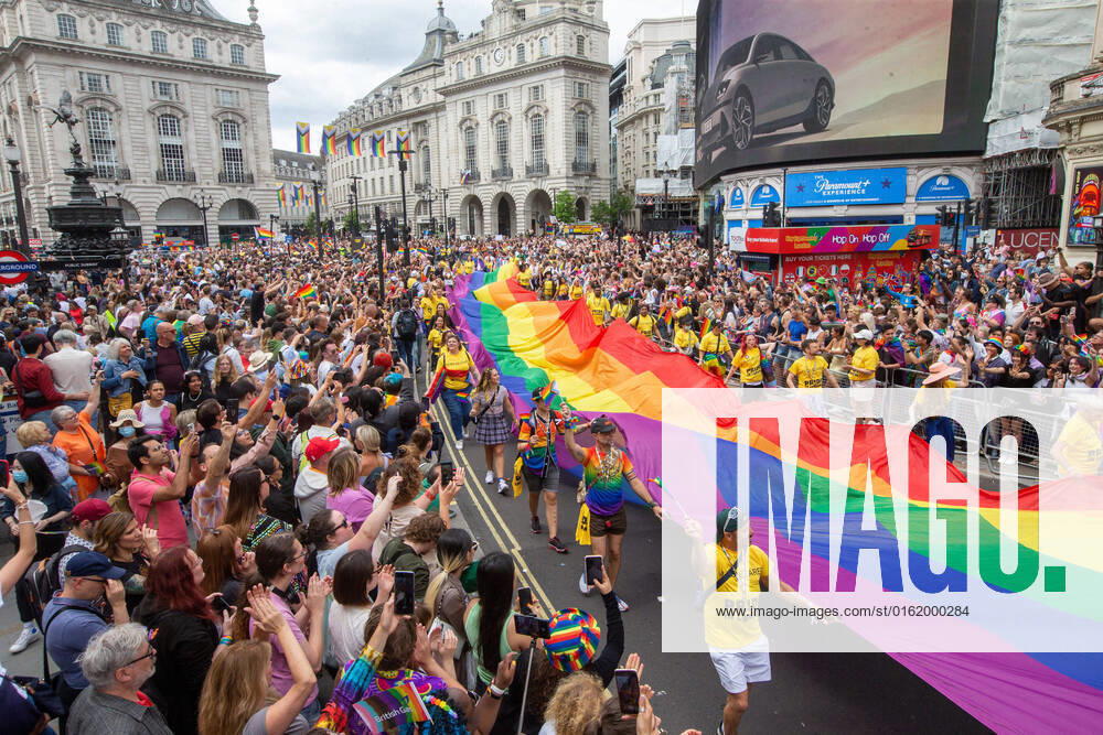 London Pride Parade is seen passing through the crowd in Piccadilly Circus. London United Kingdom - ZUMAs262 20220702_zip_s262_007
