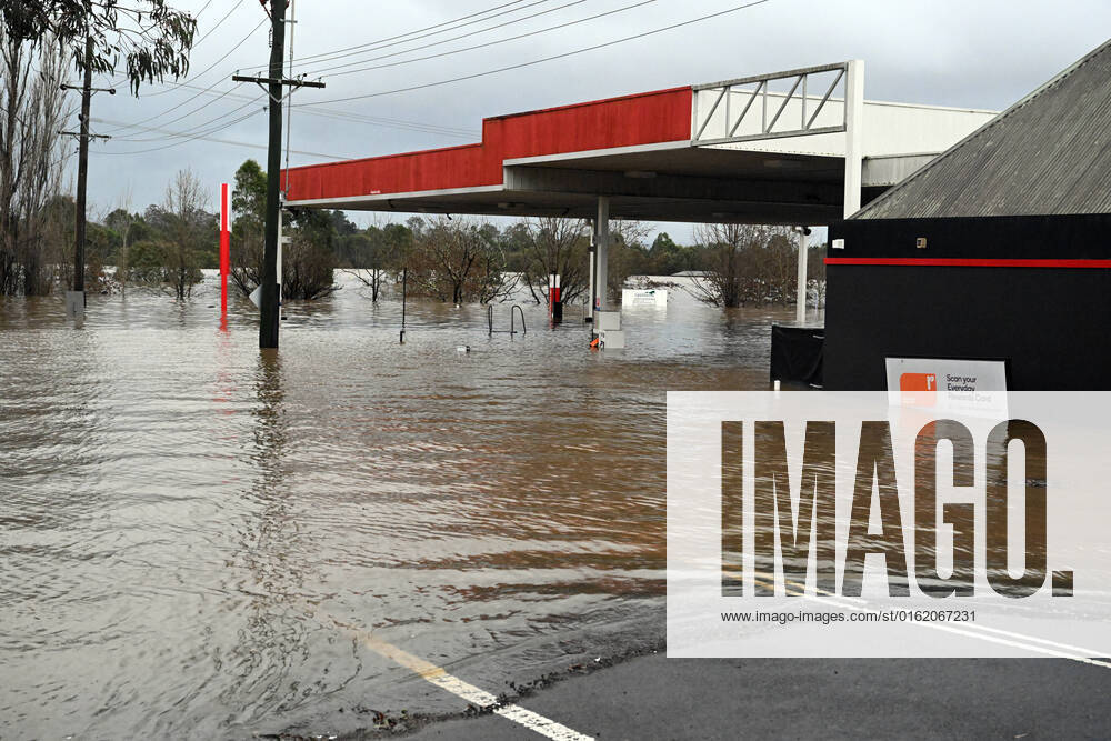 FLOODING NSW, A petrol station is seen inundated by floodwaters in Camden in South Western Sydney, Sunday, July 3, 2022. ( NO ARCHIVING, , NO USE IN BOOKS WITHOUT CONSENT SYDNEY NSW AUSTRALIA