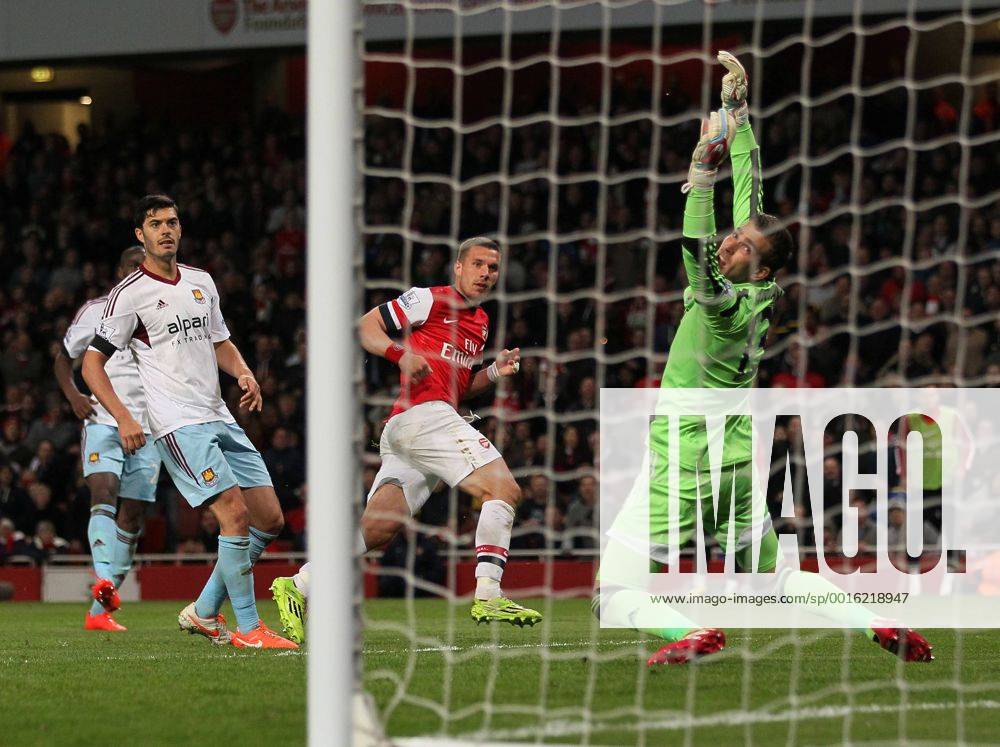 Arsenal s Lukas Podolski celebrates scoring his sides third goal Arsenal vs West Ham United- Barclays Premier League - Emirates Stadium - London - England - 15 04 2014 - Pic David Klein Sportimage .