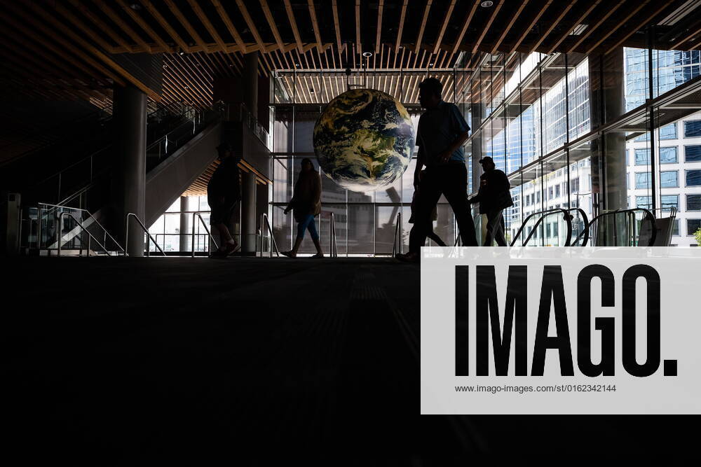 Delegates are silhouetted as they arrive for the opening day of the Assembly of First Nations annual general meeting, in Vancouver, on Tuesday, July 5, 2022. VANCOUVER CANADA - ZUMAc35_ 20220705_zaf_c35_019