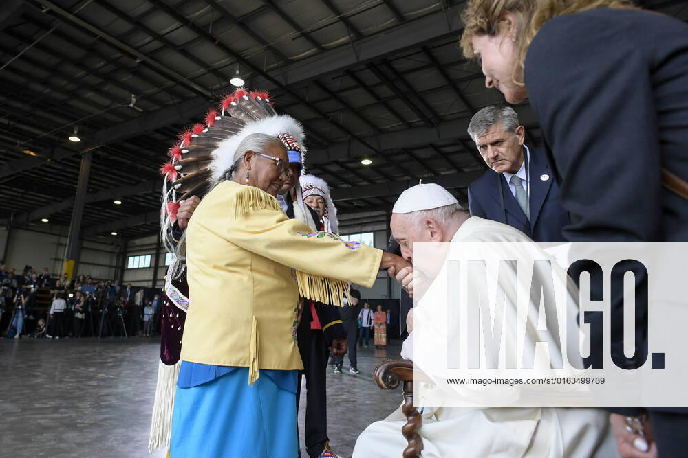 Canada, Alberta, 2022 07 24 Pope Francis meets members of an indigenous tribe during his welcoming ceremony at Edmonton International Airport in Alberta, western Canada Photograph by Vatican Mediia Catholic Press Photo. RESTRICTED TO EDITORIAL USE - NO MARKETING - NO ADVERTISING CAMPAIGNS.