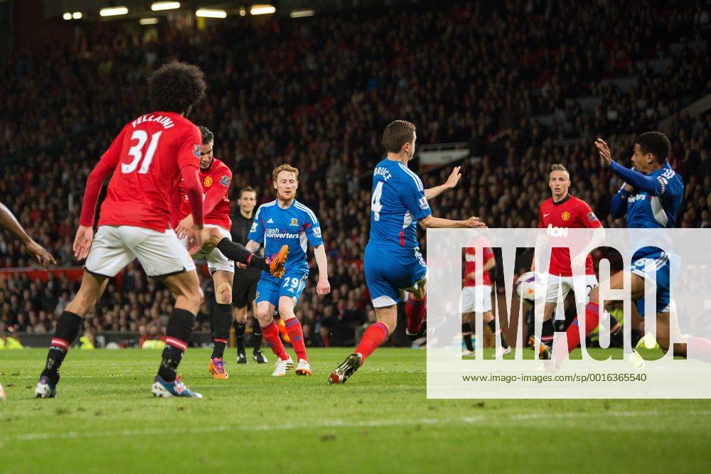 Robin van Persie of Manchester United scores his sides third goal - Barclays Premier League - Manchester United (ManU) vs. Hull City - Old Trafford - Manchester - England - 6th May 2014 - .