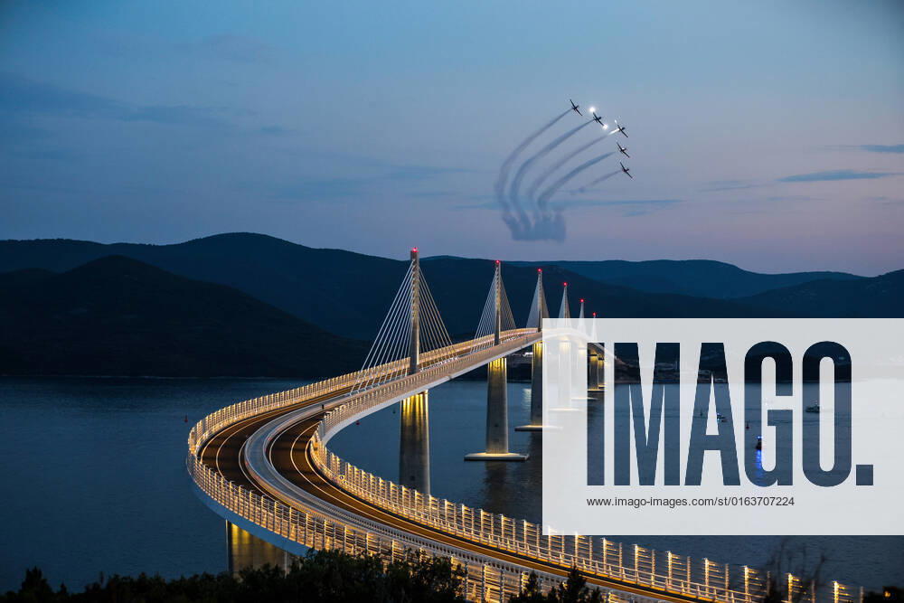 Wings of Storm at Peljesac Bridge The Croatian Air Force aerobatic team, Wings of Storm, perform during Peljesac Bridge Opening Ceremony in Komarna, Croatia on July 26, 2022. IgorxKralj PIXSELL