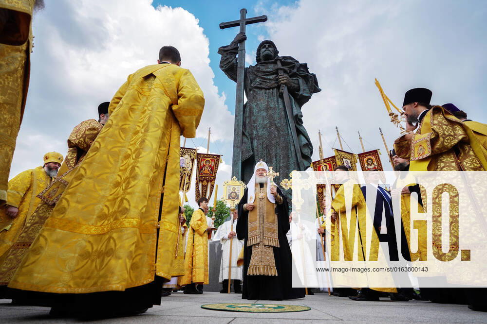 Russia Religion Patriarch Rus Baptism Day 8244241 28.07.2022 In this handout photo released by the Russian Orthodox Patriarch s press office, Russian Orthodox Patriarch Krill conducts a service marking the 1034th anniversary of Baptism of Rus by the monument to the Baptist of Rus Prince Vladimir on Borovitskaya Square, in Moscow, Russia. Editorial use only, no archive, no commercial use. Russian Orthodox Patriarch s press office Moscow Russia