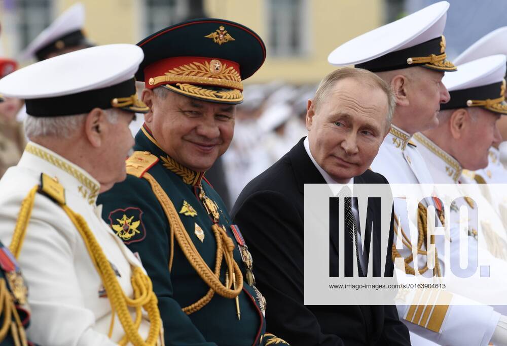 Russia Putin Navy Day 8245917 31.07.2022 Russian President Vladimir Putin, accompanied by Russian Defence Minister Sergei Shoigu, takes part in the main naval parade marking Russian Navy Day, in St. Petersburg, Russia. Alexei Danichev Sputnik St. Petersburg Russia