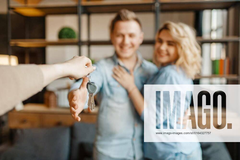 Newly married love couple receive as gift the keys, Newly married love couple receive as a gift the keys to the apartment. Happy lifestyle, beautiful relationship. Smiling husband and wife takes a present, Newly married love couple receive as a gift the keys to the apartment. Happy lifestyle, beautiful relationship. Smiling husband and wife takes a present model released, Symbolfoto , 05.02.2020,