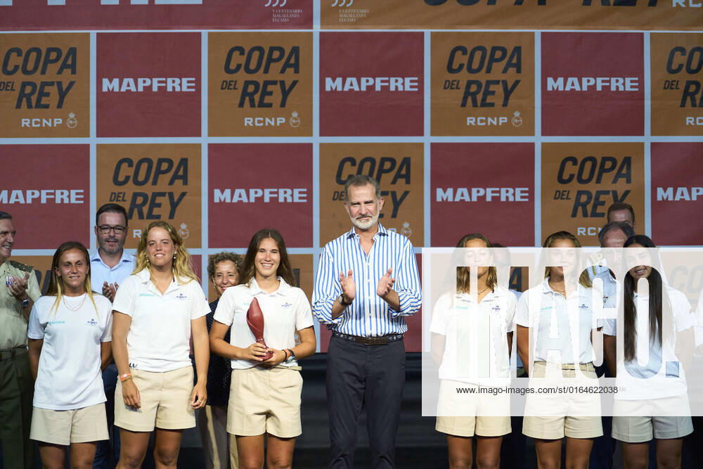 King Felipe with the sailing crew of overall winner Balearia attends the 40th Copa del Rey Mapfre Sailing Cup ceremony award at Ses Voltes on Palma de Mallorca. No Spain Â
