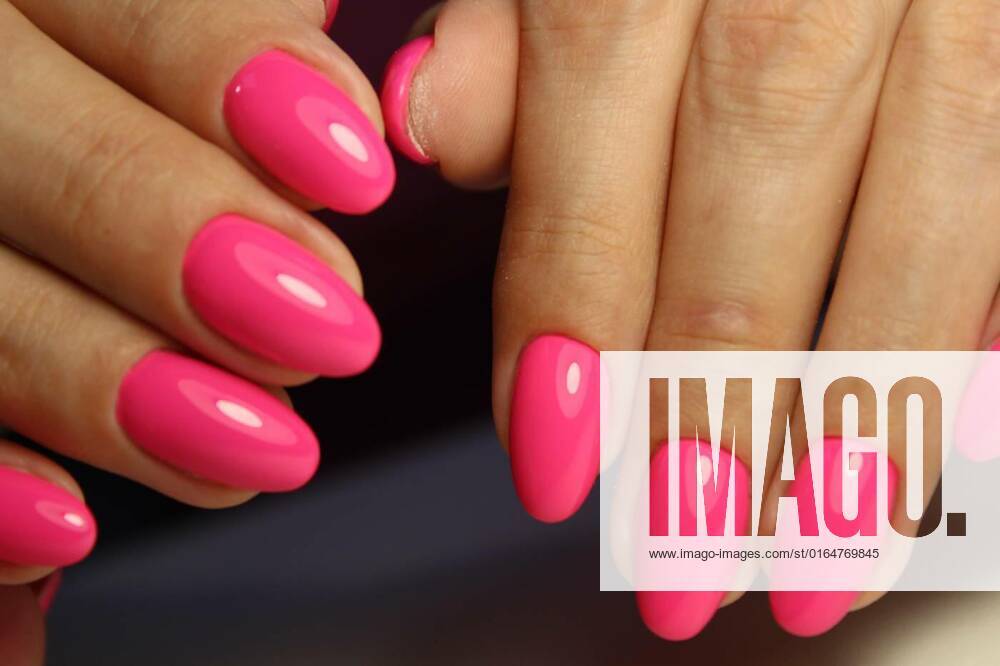 IMAGO Creative, Lifestyle, Barbiecore sexy pink manicure on long beautiful nails, Design sexy pink manicure on long beautiful nails, Design sexy pink manicure on long beautiful nails, 22.08.2020,