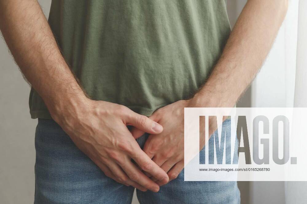 Man cover his groin by hands. Men s health. Urology problems male, Man cover his groin by hands. Men s health. Urology problems male. Natural light photo, Man cover his groin by hands. Men s health. Urology problems male. Natural light photo, 20.11.2020,