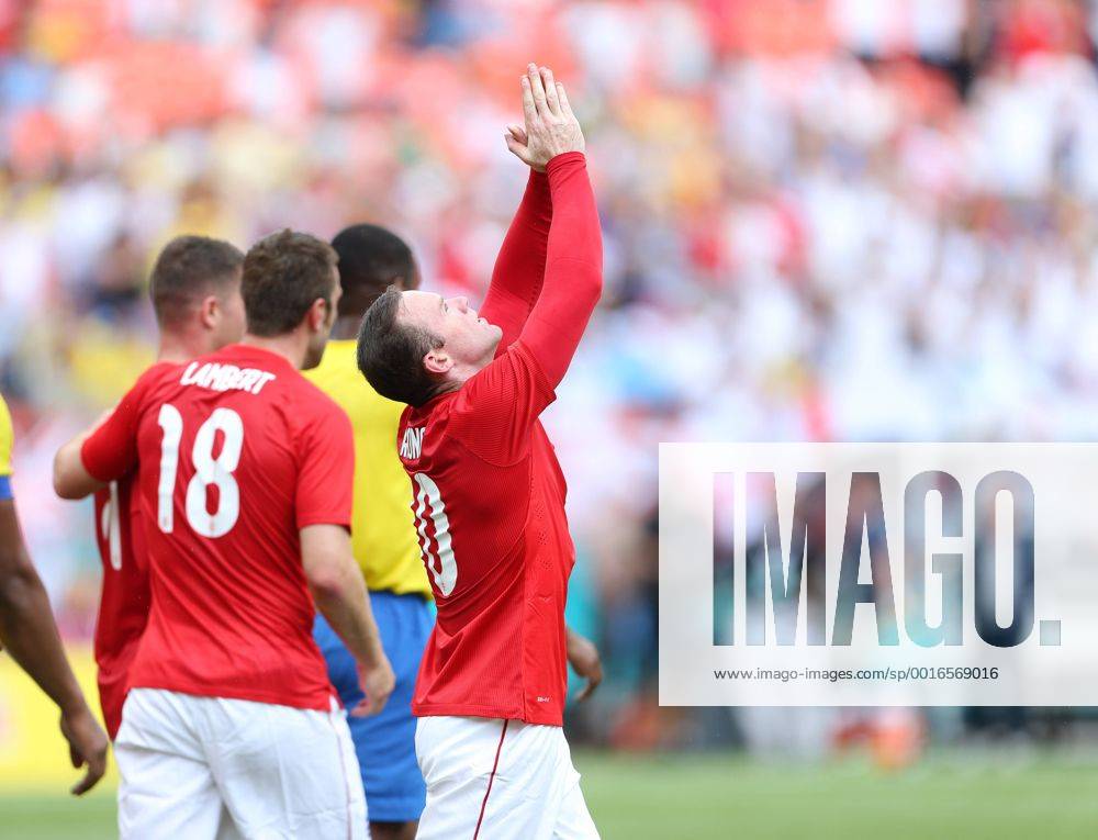 England s Wayne Rooney celebrates scoring his sides opening goal after Rickie Lambert hits the post England v Ecuador - International Friendly - Sun Life Stadium- Miami - USA - 04 06 2014 - Pic David Klein Sportimage .