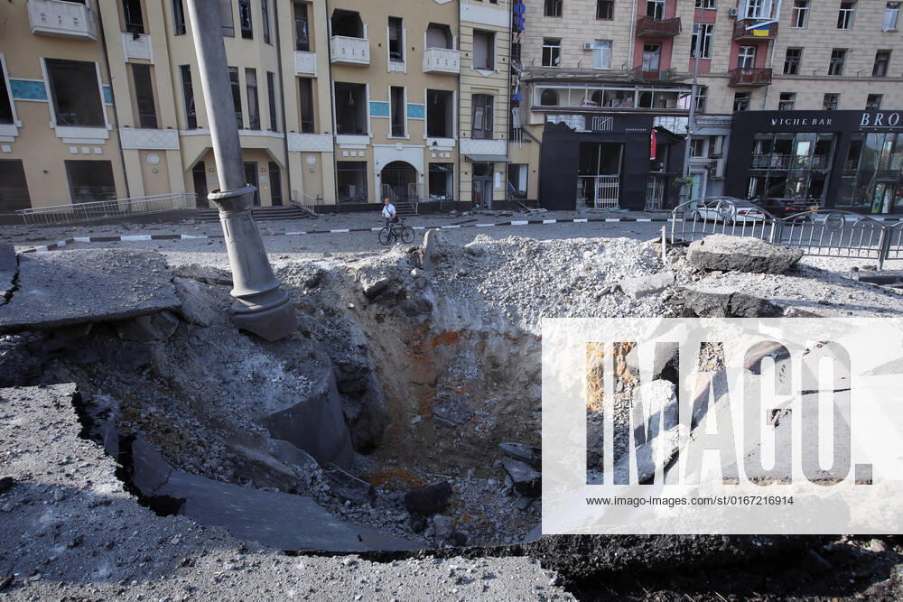 KHARKIV, UKRAINE - AUGUST 27, 2022 - The crater from a rocket fired by the Russian troops is pictured near the Peasants House in central Kharkiv, northeastern Ukraine. Russian missile attack on Kharkiv