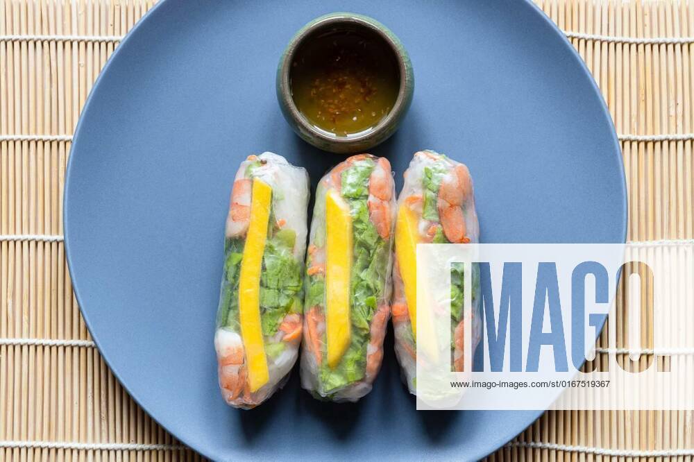 Top view of Nem Cuon Vietnamese fresh spring rolls, top view of portion of Nem Cuon, Vietnamese fresh spring rolls on gray blue plate, top view of portion of Nem Cuon, Vietnamese fresh spring rolls on gray blue plate, 23.10.2021,