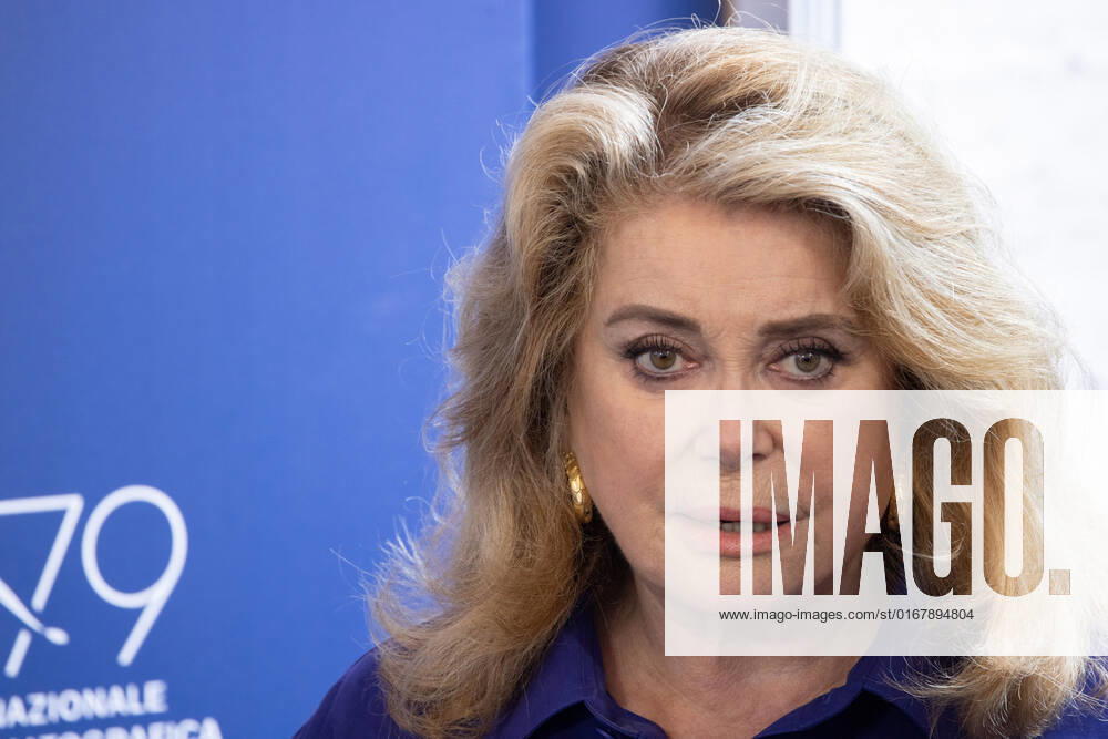 French actress Catherine Deneuve, wearing a flag of Ukraine on her shirt, poses on August 31, 2022, during a photocall for the Golden Lion for Lifetime Achievement she is to be awarded, on the opening day of the 79th Venice International Film Festival at Venice Lido. Â Photo: Cinzia Camela.
