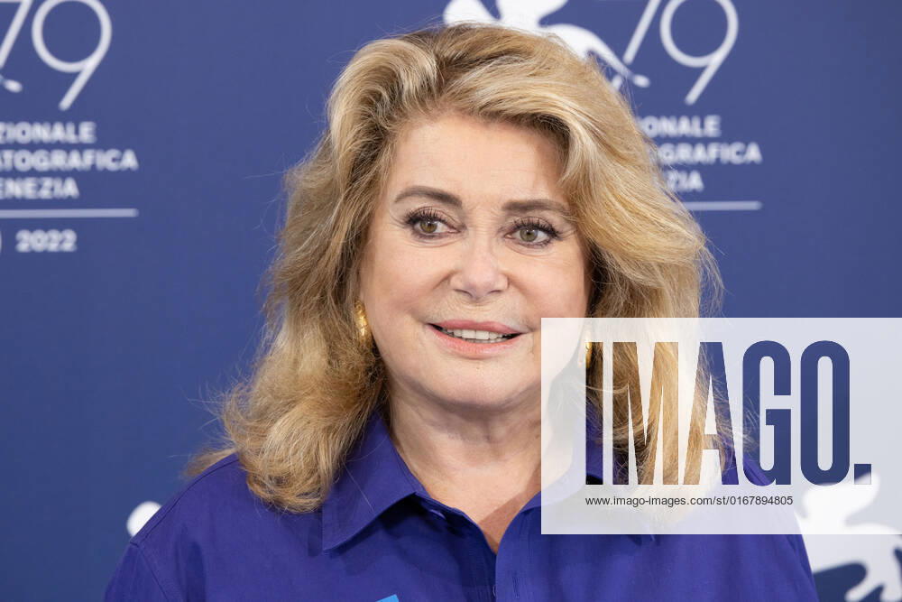 French actress Catherine Deneuve, wearing a flag of Ukraine on her shirt, poses on August 31, 2022, during a photocall for the Golden Lion for Lifetime Achievement she is to be awarded, on the opening day of the 79th Venice International Film Festival at Venice Lido. Â Photo: Cinzia Camela.