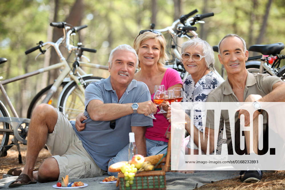 Four senior people toasting at picnic, model released, , 5618792.jpg, activity, bike, camping, clubby, coast, convivial, couples, dessert, drink, entertaining, festive, forest, four, friendly, friends, fruits, funny, gay, glad-handering, hearty, hilarious, holidays, hot, jolly, jovial, mature, ocean, people, picnic, pine, red, retired, rose, sea, senior, snacking, summer, toast, walk, week-end, wine,