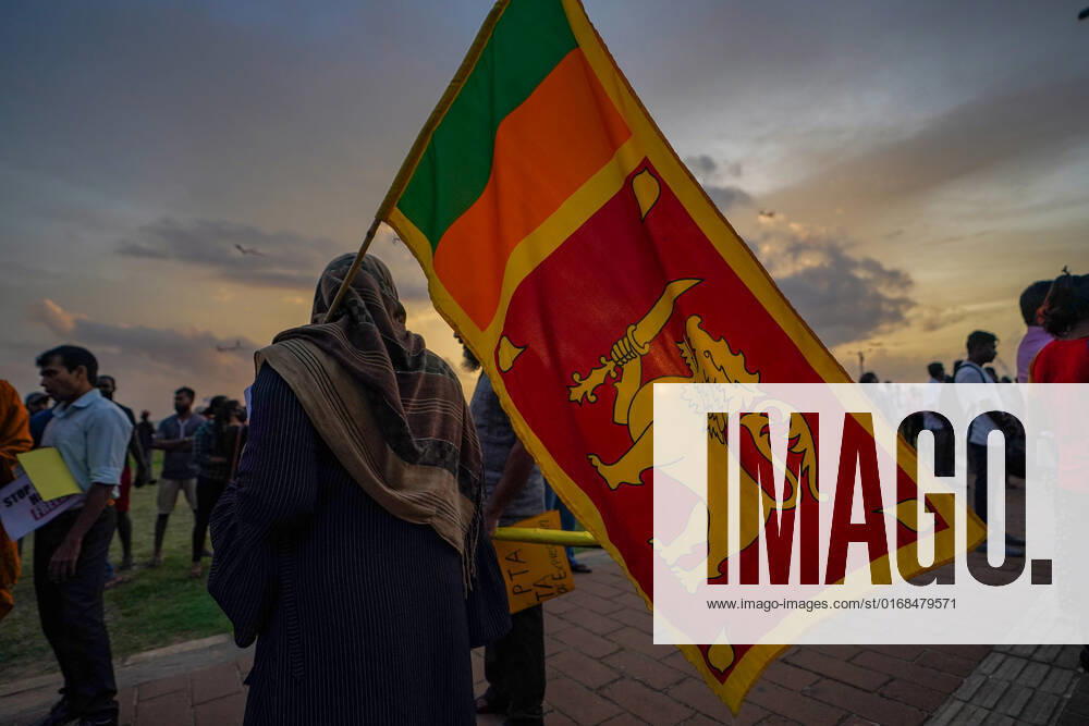 Protest In Colombo, Sri Lanka Anti-government protester with Sri Lankan Flag at Galle Face. September 09, 2022 Colombo, Sri Lanka.This protest was held to demand the release of the activists who were imprisoned in the recent protests and to remember all those who died or were disabled during the recent protests. Apart from this, their main slogans were to demand not to increase the prices of goods. Colombo Sri Lanka