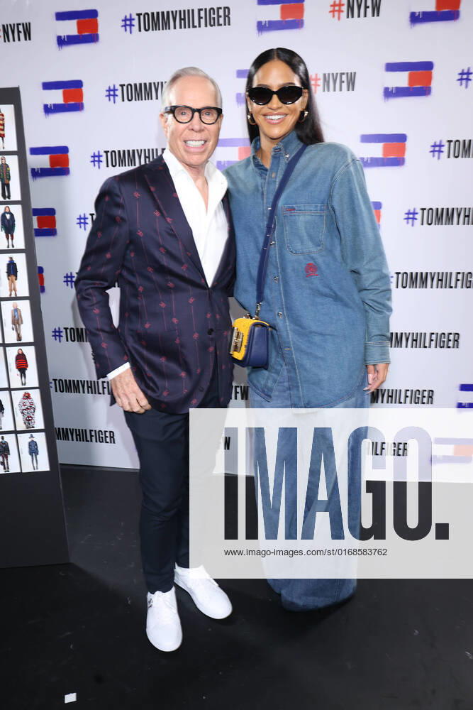 NEW YORK, NY- SEPTEMBER 11: Tommy Hilfiger and Cassie at the Tommy Hilfiger Fashion show at 2022 New York Fashion Week at the skyline drive in Brooklyn, New York City on September 11, 2022.