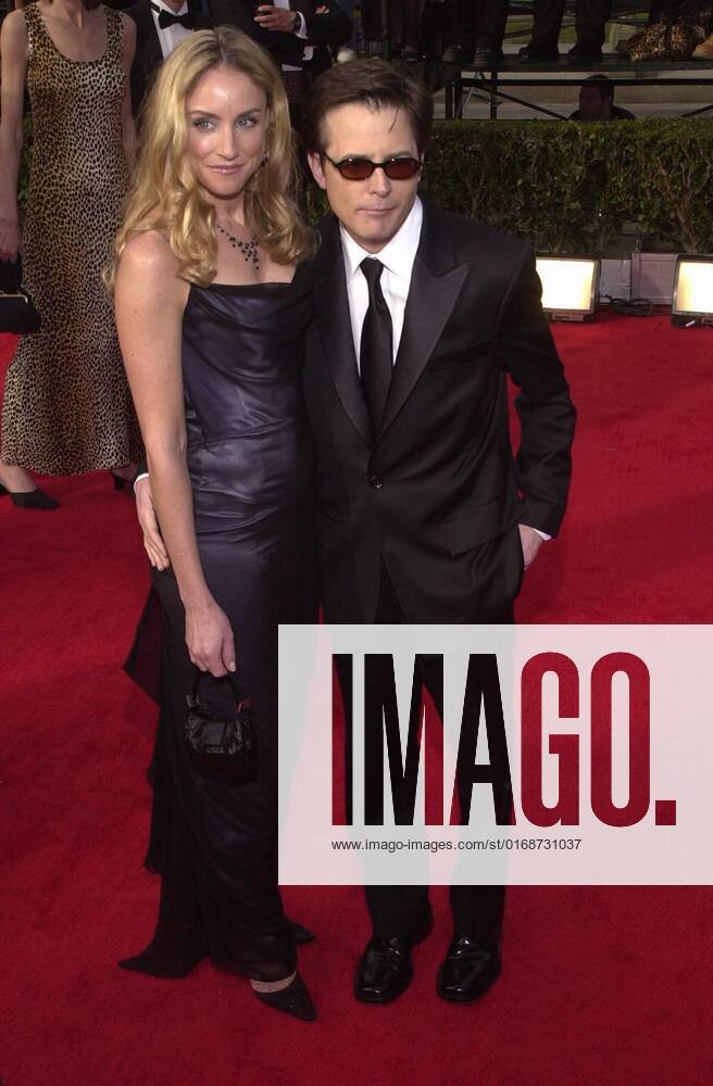 Tracy Pollan and Michael J. Fox at the 6th Annual Screen Actors Guild Awards, Shrine Auditorium, 03-12-00 , 10545644.jpg, blonde, longhair, brunette, glasses, sunglasses, necklace, entertainment, star, popular, event,