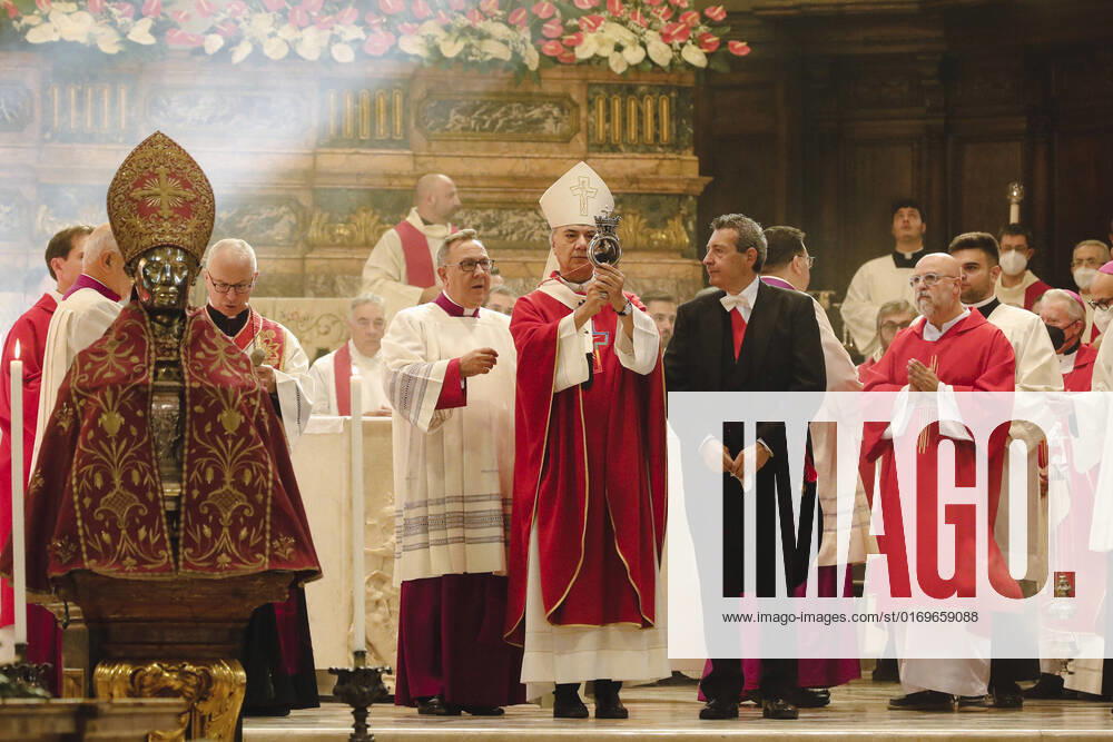 The bishop of Naples, Domenico Battaglia (C), shows the ampoule with liquefied blood during the ceremony for the solemnity of San Gennaro, in the cathedral. The Miracle of San Gennaro was repeated when the blood of the Patron Saint of Naples was crystallized in the cathedral of the city.