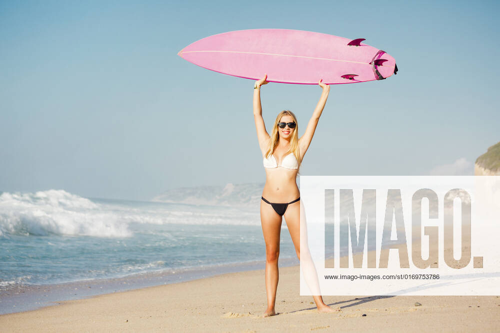 A beautiful surfer girl at the beach with her surfboard, model released, , 15761834.jpg, women, beautiful, surf, beach, happy, surfer, summer, surfing, holding, up, air, bikini, free, sexy, girl, teen, success, surfboard, young, woman, board, blonde, sunglasses, sport, fashion, ocean, fun, vacation, pretty, holiday, sunny, lifestyle, freedom, sea, sand, teenager, healthy, water, one, exercise, waves, caucasian, outdoors, travel, copyspace, pink,