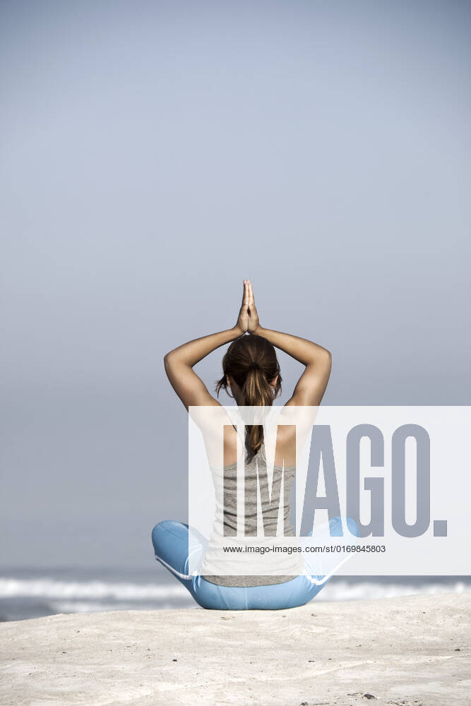 Beautiful young woman with arms open, relaxing on the beach, model released, , 1924933.jpg, woman, beautiful, young, beach, meditation, yoga, exercise, pose, freedom, active, free, summer, relax, beauty, training, balance, relaxing, recreation, flexible, enjoy, serenity, siting, Caucasian, coast, sport, energy, female, fitness, girl, health, back, healthy, joy, lifestyle, nature, rock, ocean, outdoor, person, pretty, sand, sea, sky, water, body, brunette, adult, athletic,