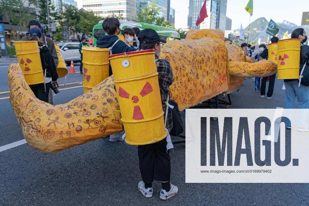 Climate Justice March In Seoul Protesters carry nuclear waste replicas at Climate Justice March around Gwanghwamun area on September 24, 2022 in Seoul, South Korea. The demonstration demanded the government to stop using Fossil Energy system and climate justice. About 10,000 people by The Police s estimate (35,000 people by The Organizer s estimate) gathered at the demonstration on the day. Seoul South Korea