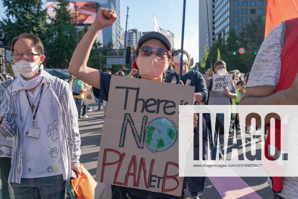 Climate Justice March In Seoul A protester holds a placard saying There is NO PLANet B at Climate Justice March around Gwanghwamun area on September 24, 2022 in Seoul, South Korea. The demonstration demanded the government to stop using Fossil Energy system and climate justice. About 10,000 people by The Police s estimate (35,000 people by The Organizer s estimate) gathered at the demonstration on the day. Seoul South Korea