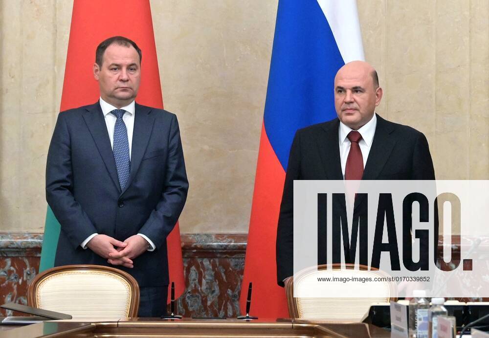 Russia Belarus 8288590 03.10.2022 Russian Prime Minister Mikhail Mishustin, right, and his Belarusian counterpart Roman Golovchenko attend a signing ceremony of the documents following their meeting in Moscow, Russia. Alexander Astafyev Sputnik Moscow Russia